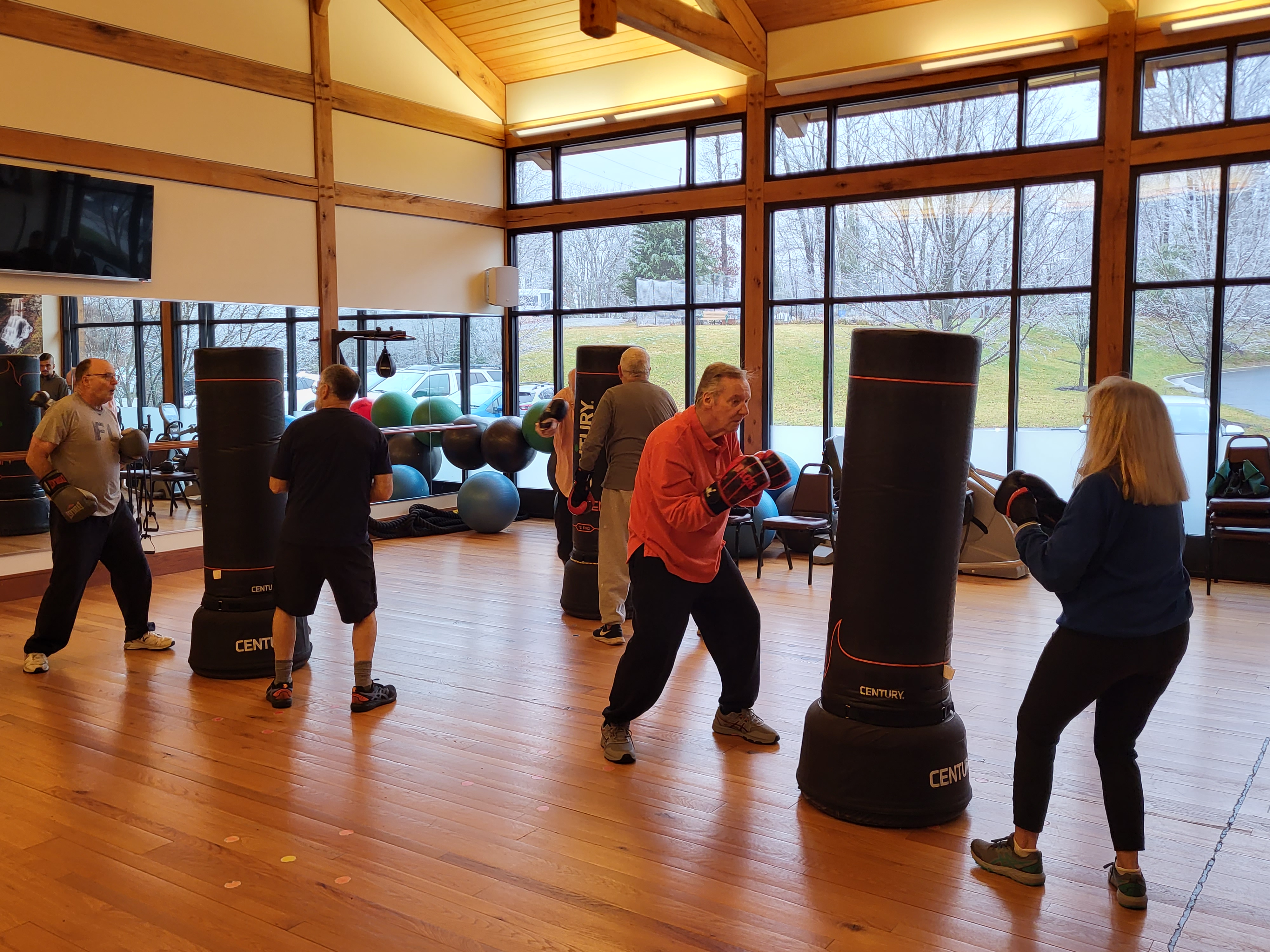 Participants taking part in Rock Steady Boxing programming.